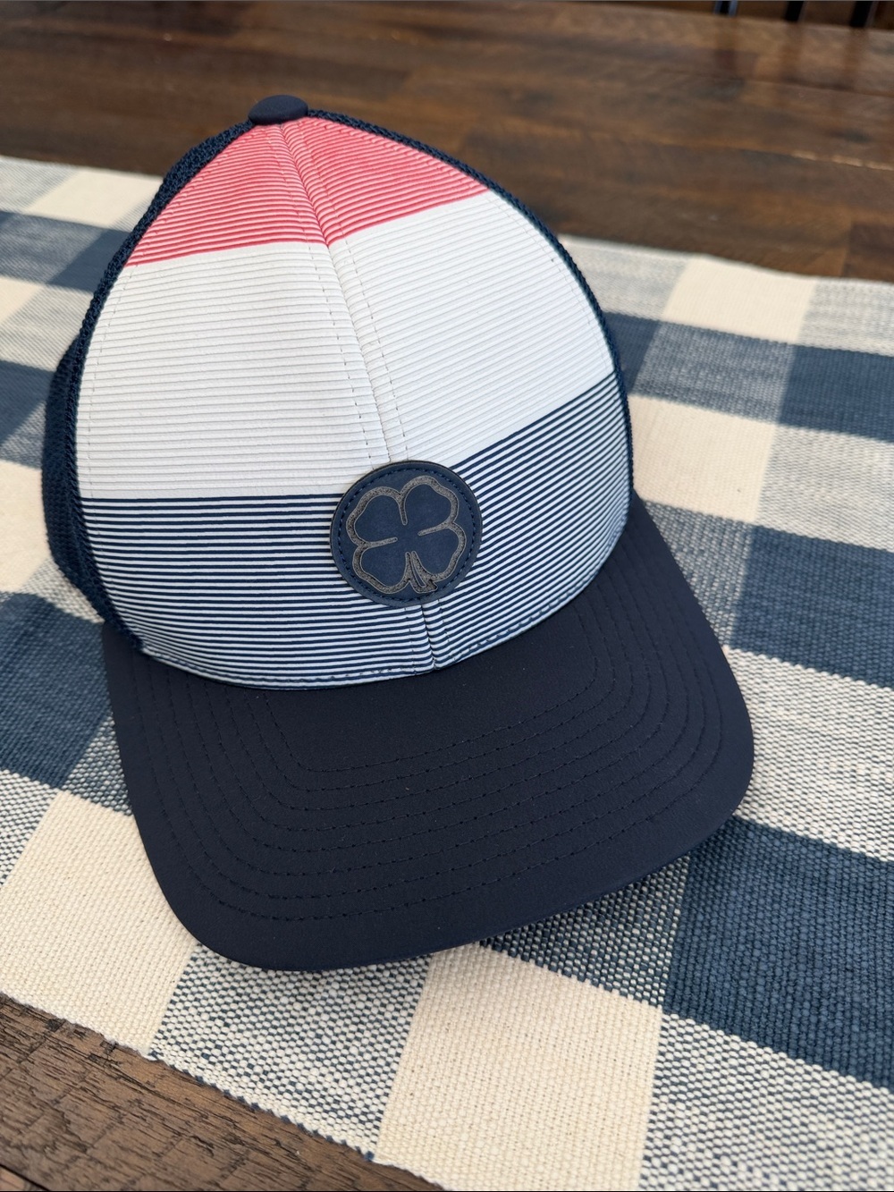 Black clover Striped Trucker Hat in Navy, White & red